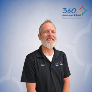 Wayne smiling in 360 Automotive and Repair uniform