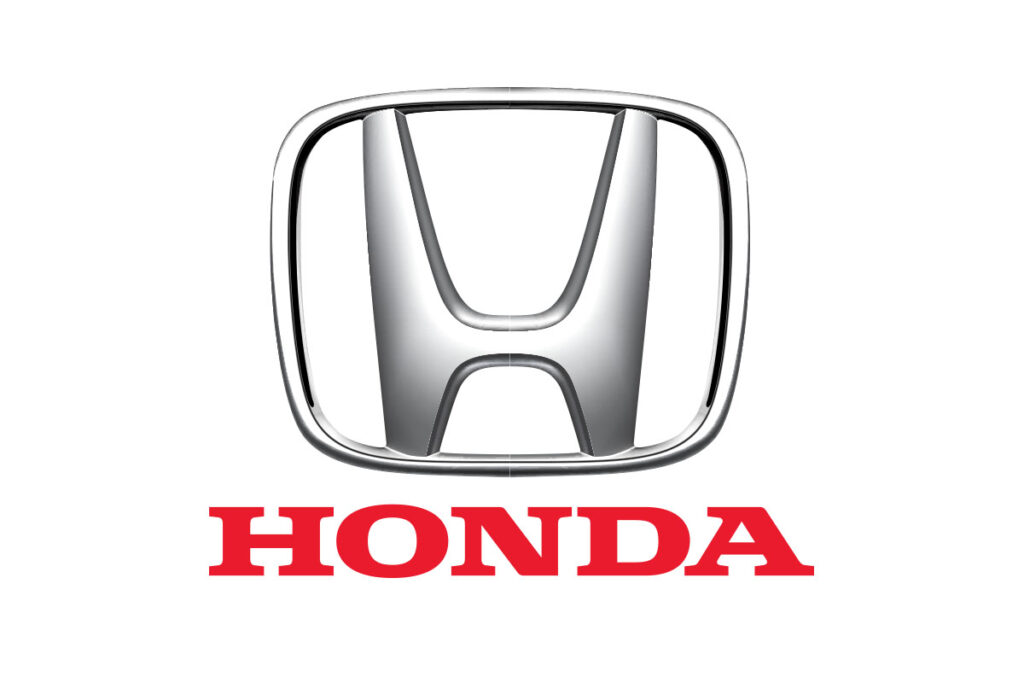 Honda silver emblem and red logo text