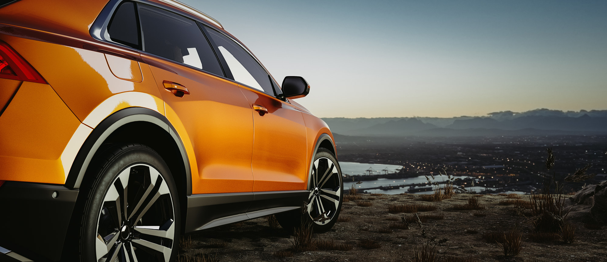Orange SUV overlooking city at sunset